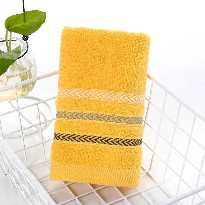 Serviette de bain éponge C orange